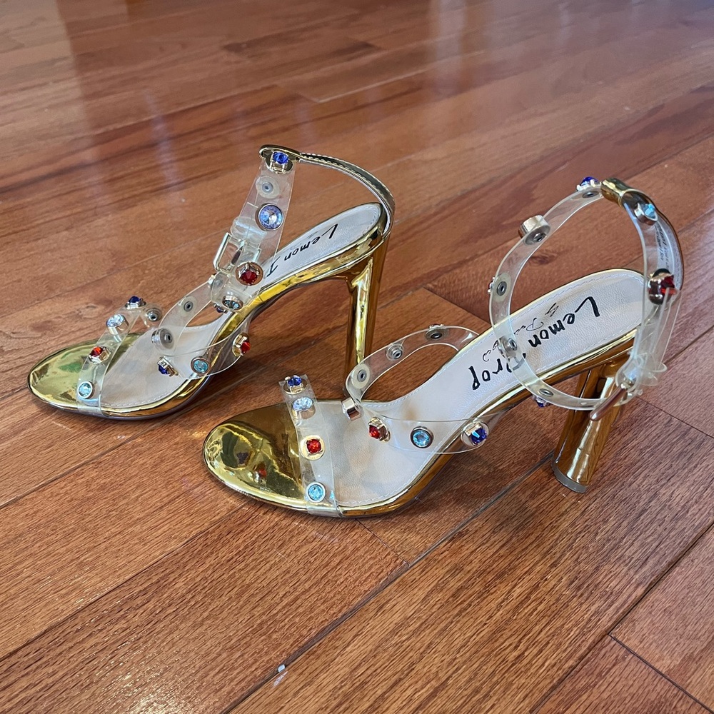 Lemon Drop Clear Strap Gold High Heels with Gem Accents